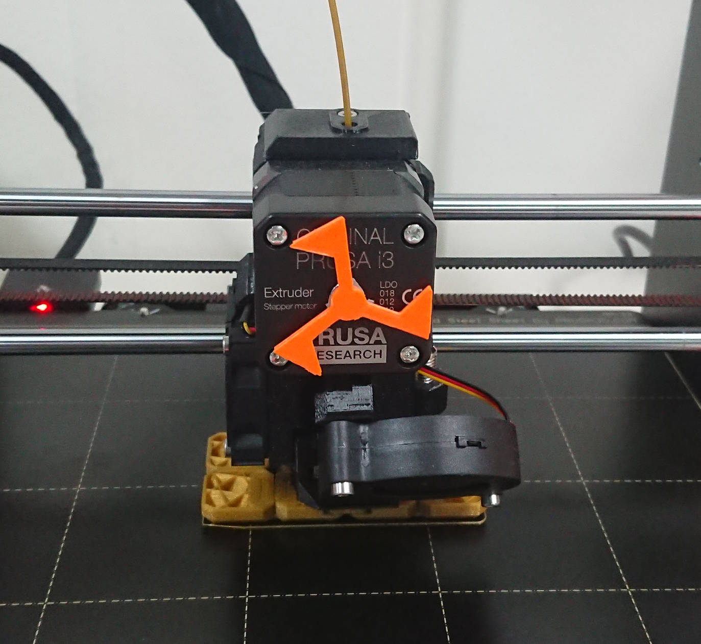 The triangle flag on the Prusa extruder motor